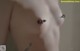 A close up of a mannequin with a tattoo on his chest.